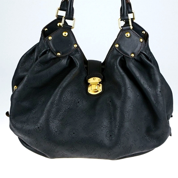 Louis Vuitton - Picture 1 of 3
